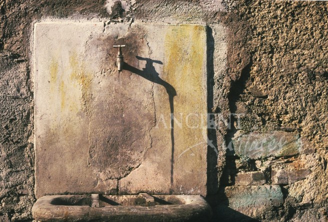 A still working 400 years old outdoor potato washing sink in Provence France.