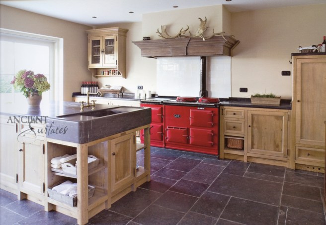 Hand Carved Basalt Sink Featured with a Traditional Custom French Cooking Range.