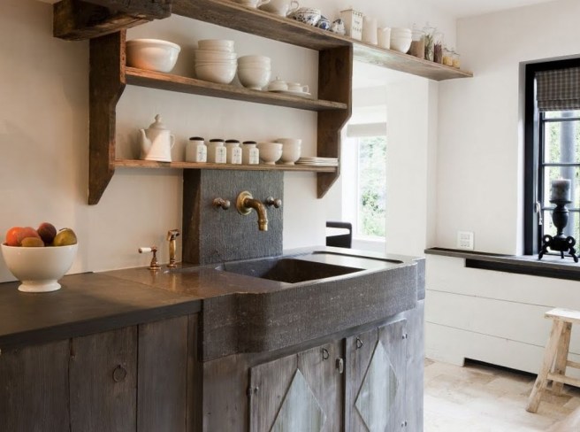 An Interesting Jet Black Basalt Sink with a Solid Sink Back.